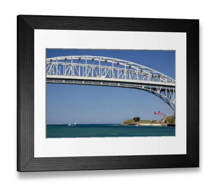Framed Print : The Blue Water Bridge is a twin-span bridge that spans the St. Clair River between Port Huron Framed Print : The Blue Water Bridge is a twin-span bridge that spans the St. Clair River between Port Huron