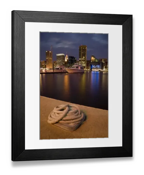 Framed Print : USA, Maryland, MD, Baltimore. A rope is coiled at a dock with the city reflected