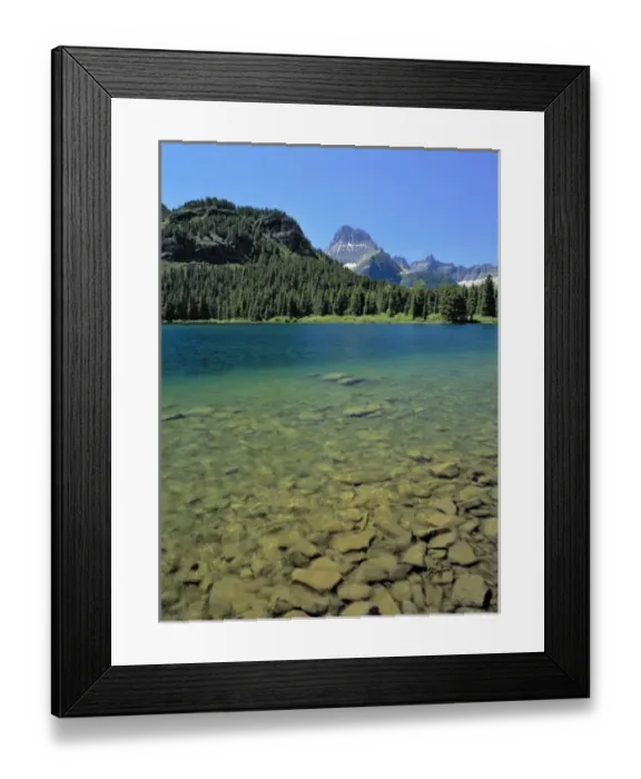 Framed Print : USA, Montana, Glacier NP. Rocks cover the shores of Swiftcurrent Lake in Glacier NP, Montana Framed Print : USA, Montana, Glacier NP. Rocks cover the shores of Swiftcurrent Lake in Glacier NP, Montana