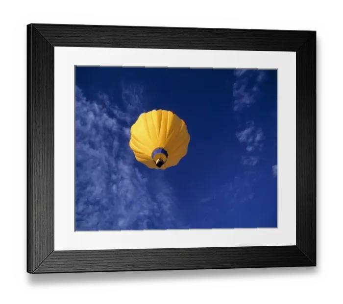 Framed Print : USA, Idaho, Teton Valley. A brilliant yellow hot-air balloon hovers over Teton Valley, Idaho Framed Print : USA, Idaho, Teton Valley. A brilliant yellow hot-air balloon hovers over Teton Valley, Idaho