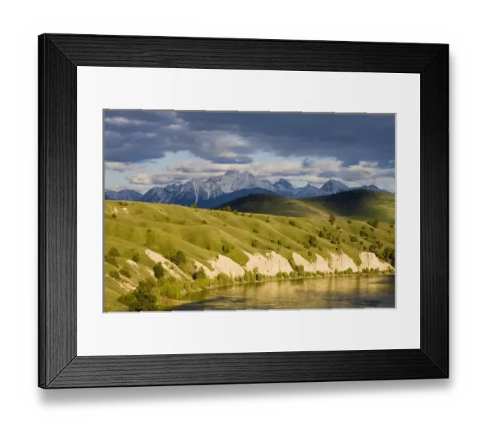 Framed Print : Clay Cliffs reflect into the Flathead River with Mission mountains in the background