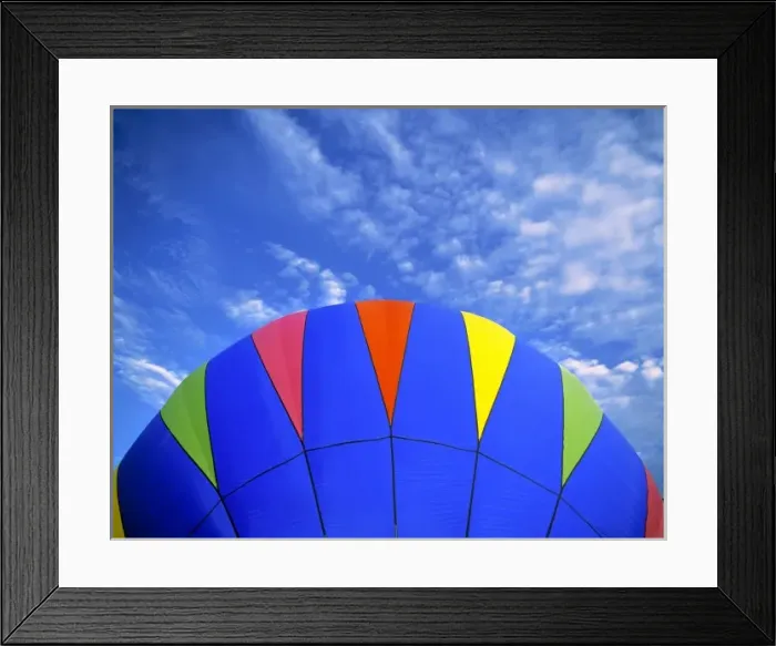 Framed Print : USA, Idaho, Teton Valley. A bright blue hot-air balloon floats over the Teton Valley Framed Print : USA, Idaho, Teton Valley. A bright blue hot-air balloon floats over the Teton Valley