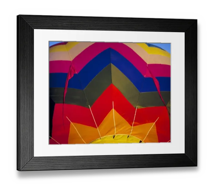 Framed Print : USA, Idaho, Teton Valley. The wildly-colored fabric of this hot-air balloon spices Framed Print : USA, Idaho, Teton Valley. The wildly-colored fabric of this hot-air balloon spices