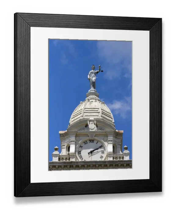 Framed Print : Lady Justice depicted with a sword and scales atop the Ionia County Courthouse in Ionia, Michigan Framed Print : Lady Justice depicted with a sword and scales atop the Ionia County Courthouse in Ionia, Michigan