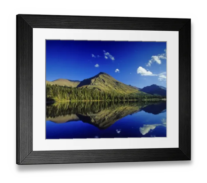 Framed Print : Appistoki Peak reflects into Pray Lake in the Two Medicine Valley of Glacier National Park Framed Print : Appistoki Peak reflects into Pray Lake in the Two Medicine Valley of Glacier National Park