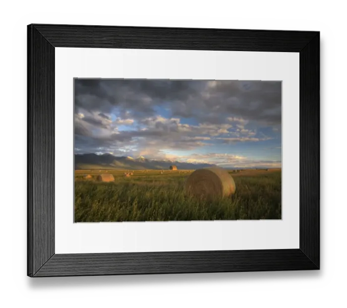 Framed Print : Old barn framed by hay bales and dramatic Mission Mountain Range in Montana Framed Print : Old barn framed by hay bales and dramatic Mission Mountain Range in Montana