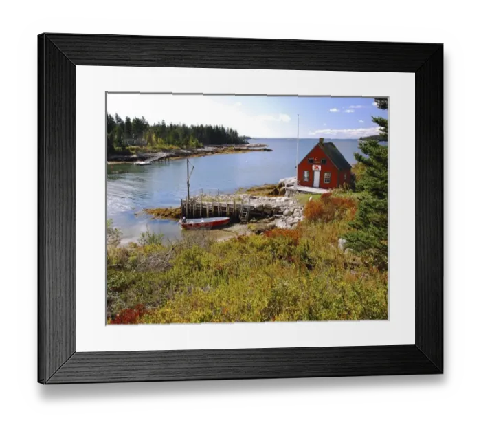 Framed Print : USA, Maine, Stonington. Man-made stone dock next to house on bay
