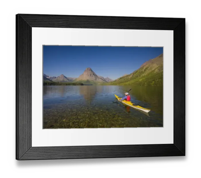Framed Print : USA, Montana, Glacier National Park, Male sea kayaker on Two Medicine Lake. (MR) Framed Print : USA, Montana, Glacier National Park, Male sea kayaker on Two Medicine Lake. (MR)