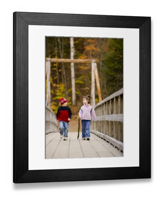 Framed Print : A young brother and sister (ages 4 and 6) hike on a suspension bridge in New Hampshire s