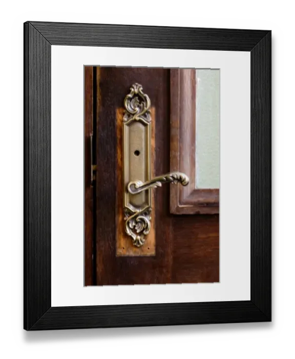 Framed Print : USA, Maine. Ornate handle on wooden door Framed Print : USA, Maine. Ornate handle on wooden door