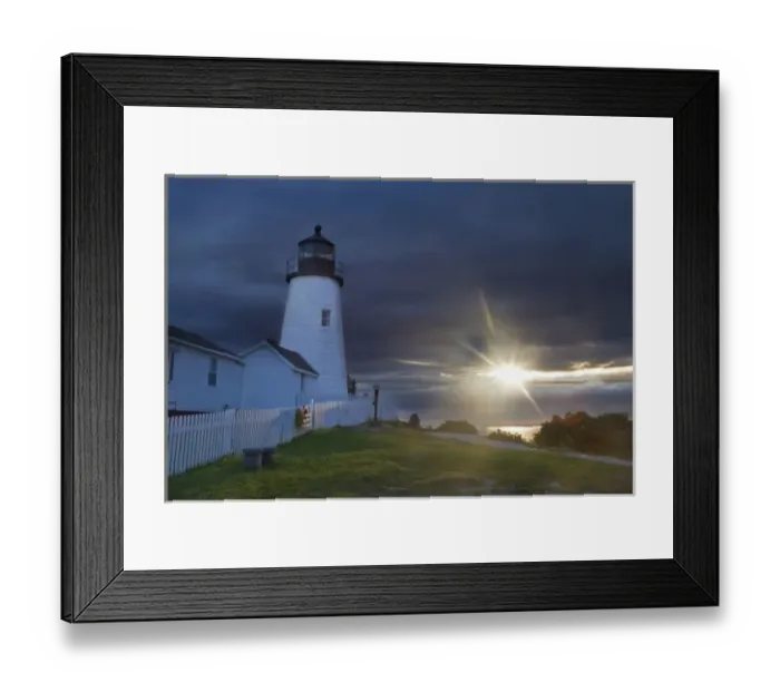 Framed Print : Sun breaks through the clouds at Pemaquid Point Lighthouse in New Harbor, Maine, USA