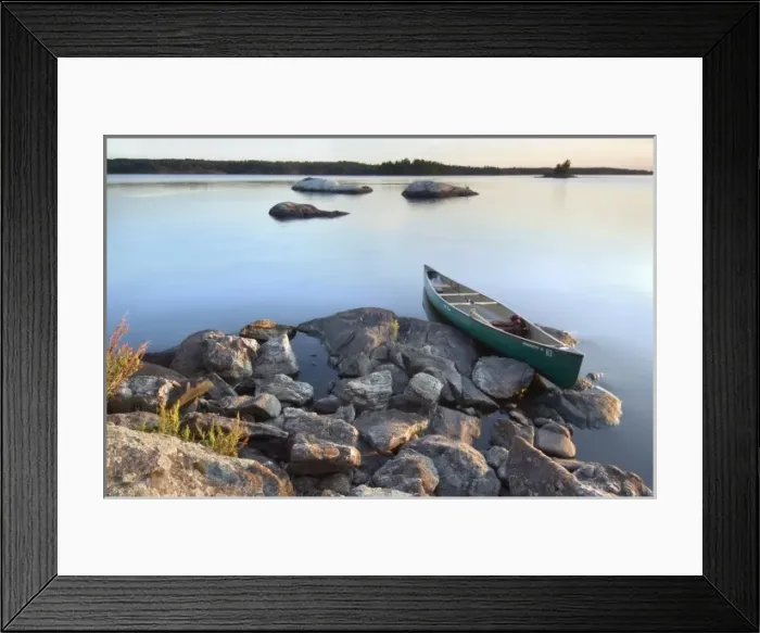 Framed Print : Canoe at sunset from rock island off the shore of Round Bear Island, Kabetogama Lake