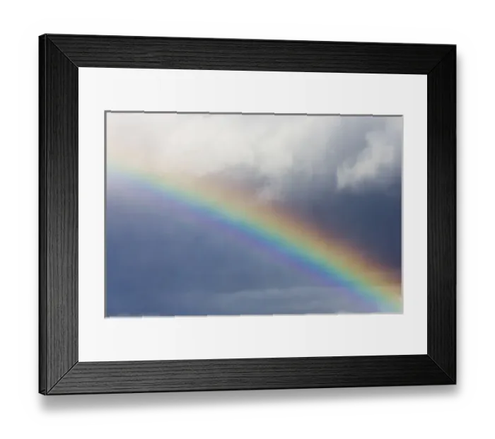 Framed Print : Photo of a rainbow breaking through a storm Framed Print : Photo of a rainbow breaking through a storm