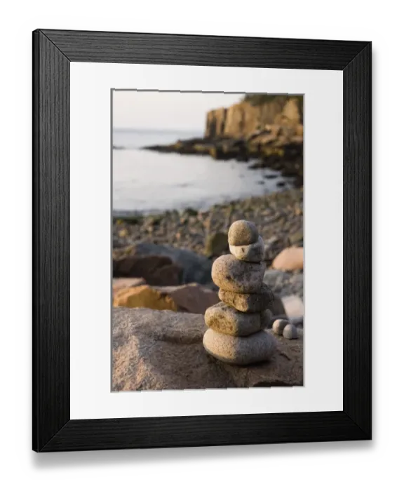Framed Print : A rock cairn on the cobblestone beach in Momument Cove in Maines Acadia National Park