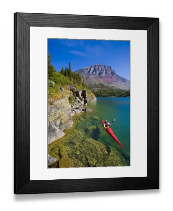 Framed Print : USA, Montana, Glacier National Park, Woman sea kayaker on St. Mary Lake. (MR) Framed Print : USA, Montana, Glacier National Park, Woman sea kayaker on St. Mary Lake. (MR)