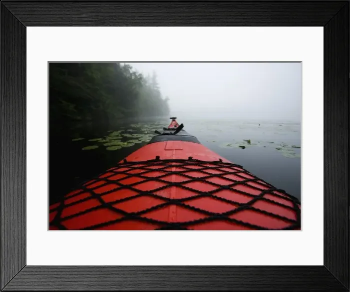 Framed Print : The bow of a kayak on a foggy morning on Mirror Lake in Woodstock, NH. Hubbard Brook