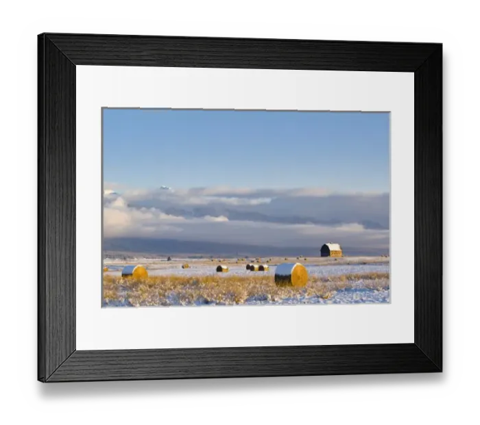 Framed Print : Rustic barn and hay bales after a fresh snow in the Mission Valley of Montana Framed Print : Rustic barn and hay bales after a fresh snow in the Mission Valley of Montana