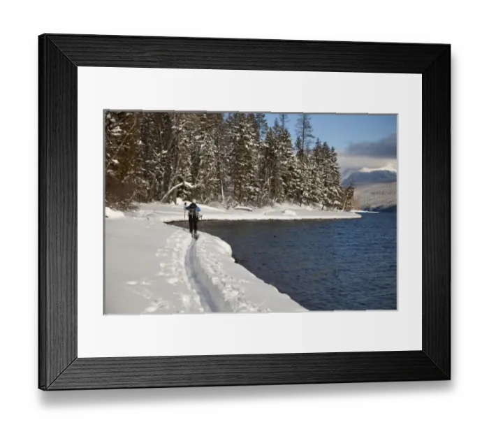 Framed Print : Cross country skiing along Lake McDonald in Glacier National Park in Montana (MR) Framed Print : Cross country skiing along Lake McDonald in Glacier National Park in Montana (MR)