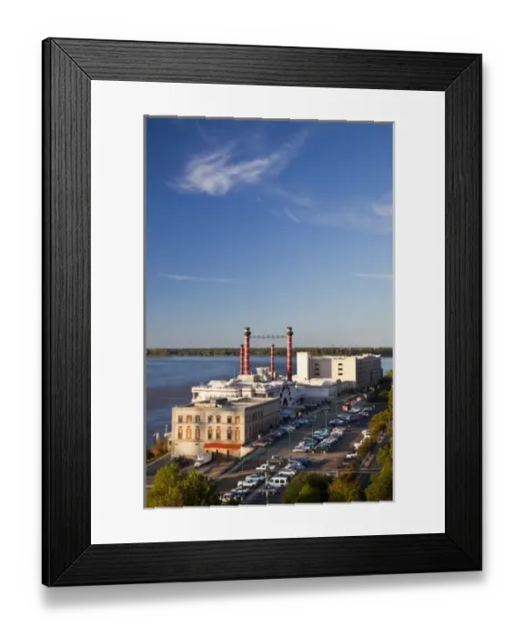 Framed Print : USA, Mississippi, Vicksburg. Ameristar Casino and Mississippi River, late afternoon
