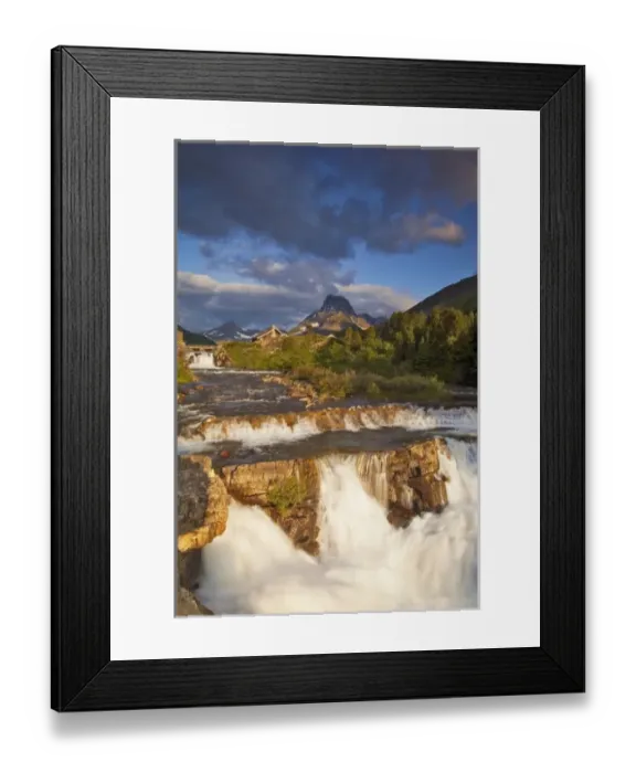 Framed Print : Morning light greets Swiftcurrent Falls in the Many Glacier Valley of Glacier National Framed Print : Morning light greets Swiftcurrent Falls in the Many Glacier Valley of Glacier National
