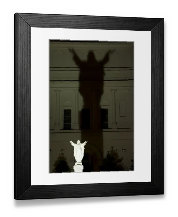 Framed Print : USA, Louisiana, New Orleans. Night scene of illuminated statue of Christ casting Framed Print : USA, Louisiana, New Orleans. Night scene of illuminated statue of Christ casting