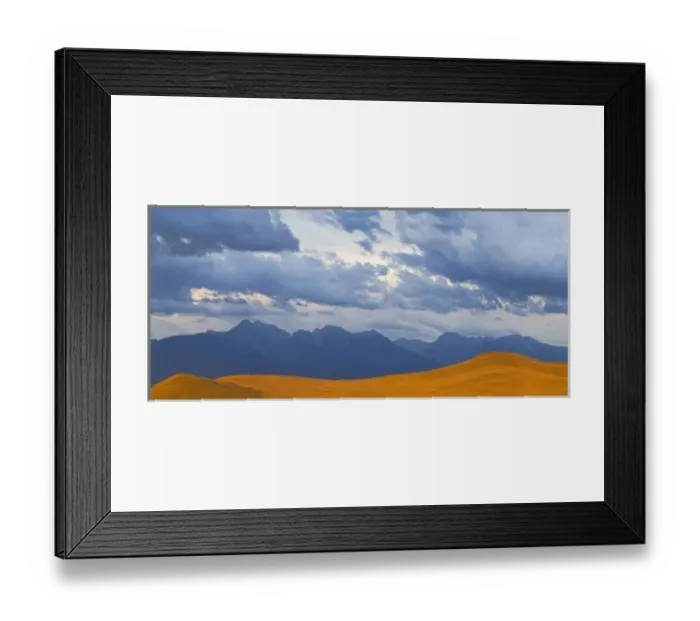 Framed Print : Panoramic view of a stormy evening over the Mission Mountains from the National Bison