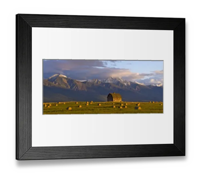 Framed Print : Old barn framed by hay bales and dramatic Mission Mountain Range in Montana Framed Print : Old barn framed by hay bales and dramatic Mission Mountain Range in Montana