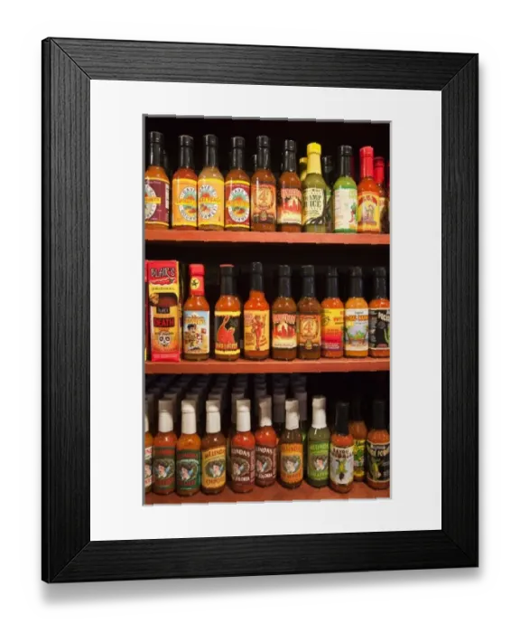 Framed Print : USA, Louisiana, New Orleans. Bottles of various hot-sauces Framed Print : USA, Louisiana, New Orleans. Bottles of various hot-sauces