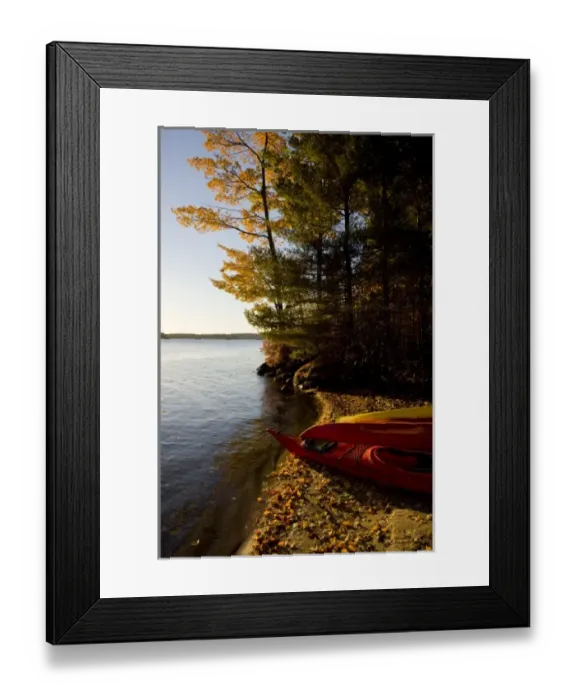 Framed Print : Kayaks on the shore on Lake Winnipesauke at Oliver Lodge in Meredith, New Hampshire