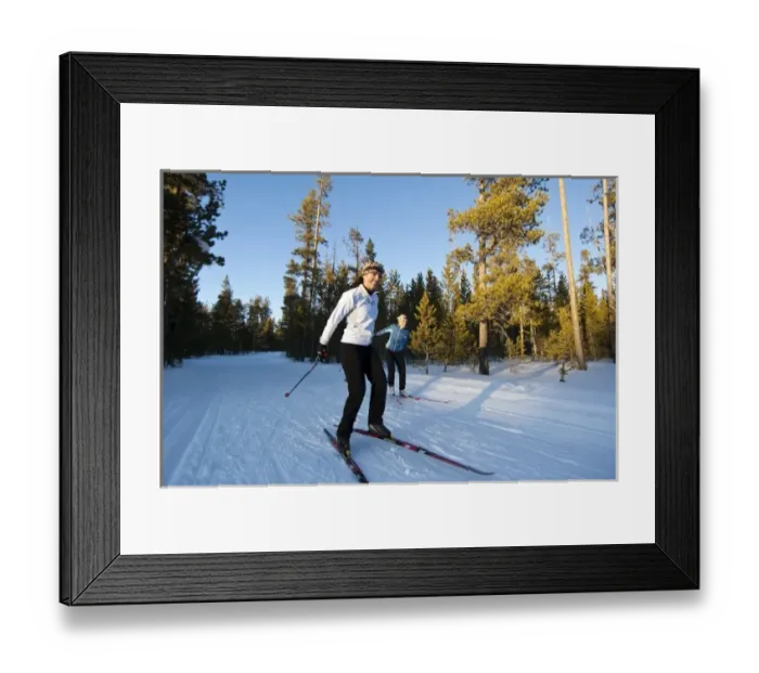 Framed Print : Cross country skiers on the Rendezvous ski trails in West Yellowstone, Montana, USA (MR)