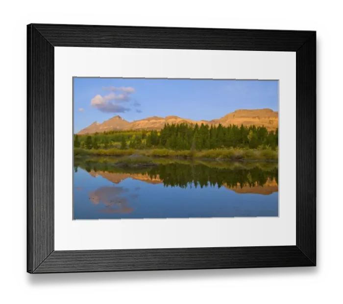 Framed Print : Beaver pond reflects first light on mountain peaks at Marias Pass in Glacier National