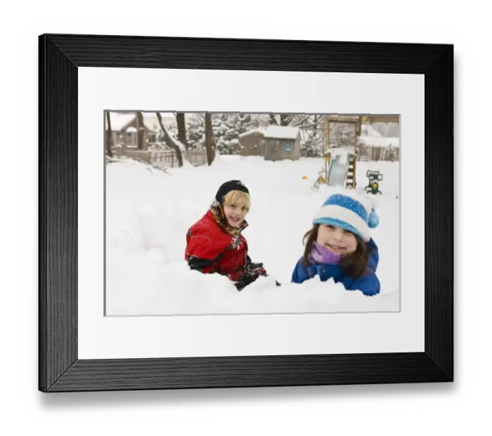 Framed Print : A brother and sister play in a snow fort in their backyard in Portsmouth, New Hampshire Framed Print : A brother and sister play in a snow fort in their backyard in Portsmouth, New Hampshire