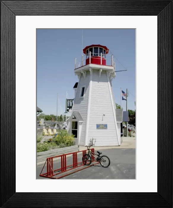 Framed Print : Business in simulated lighthouse in South Haven Michigan Framed Print : Business in simulated lighthouse in South Haven Michigan