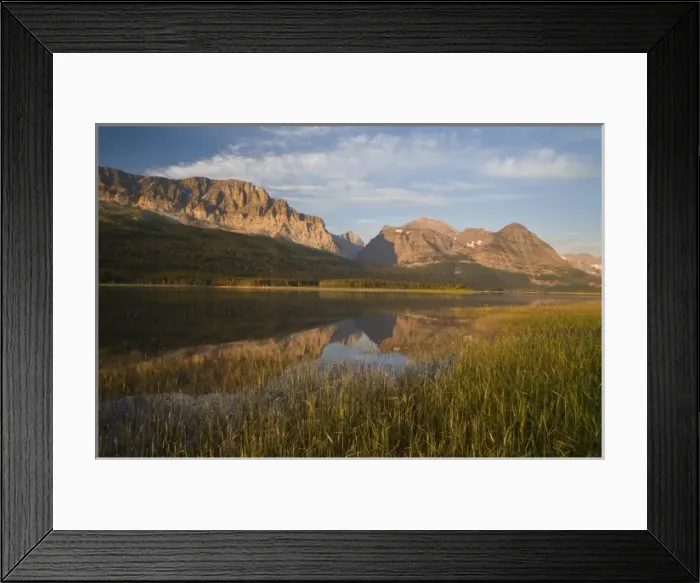 Framed Print : Wynn and Allen Mountains reflect into calm Lake Sherburne in Glacier National Park