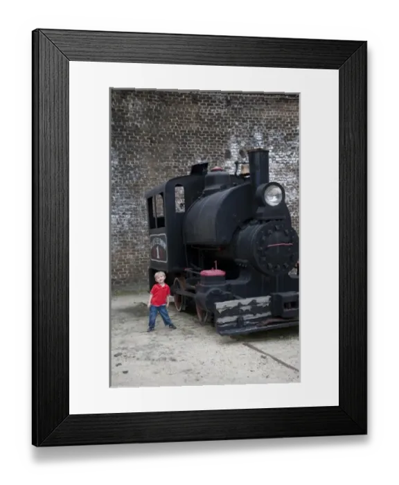Framed Print : USA; Georgia; Savannah. Young boy at Roundhouse Train Museum. (MR) Framed Print : USA; Georgia; Savannah. Young boy at Roundhouse Train Museum. (MR)