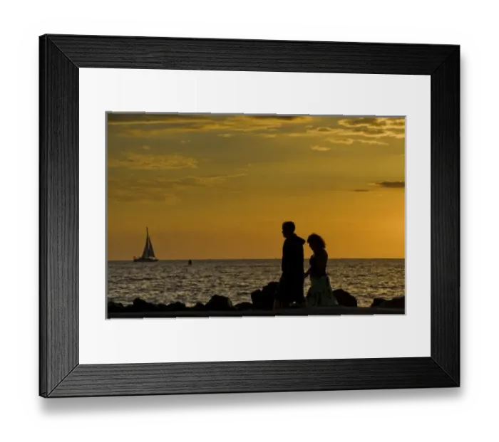 Framed Print : USA, Hawaii. A couple walks on the waterfront at sunset Framed Print : USA, Hawaii. A couple walks on the waterfront at sunset