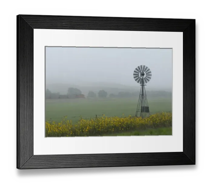 Framed Print : The Nebraska Sandhills is remote, dramatic and wild country dotted with working windmills