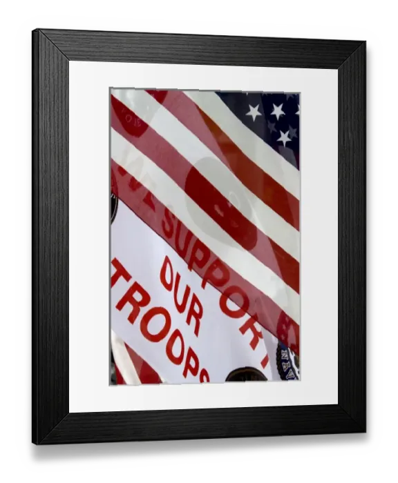 Framed Print : USA, Indiana, Carmel. The message Support Our Troops partly seen through the American flag Framed Print : USA, Indiana, Carmel. The message Support Our Troops partly seen through the American flag