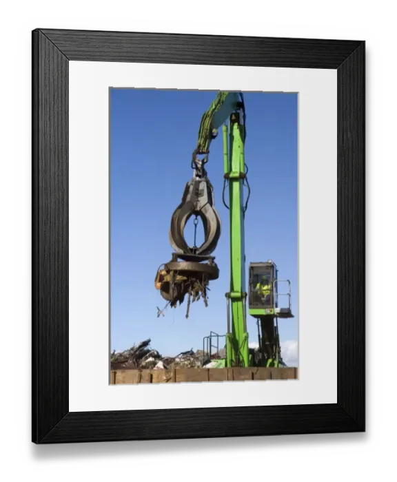 Framed Print : Electromagnetic crane lifting scrap steel for recycling at the Pacific Steel Framed Print : Electromagnetic crane lifting scrap steel for recycling at the Pacific Steel