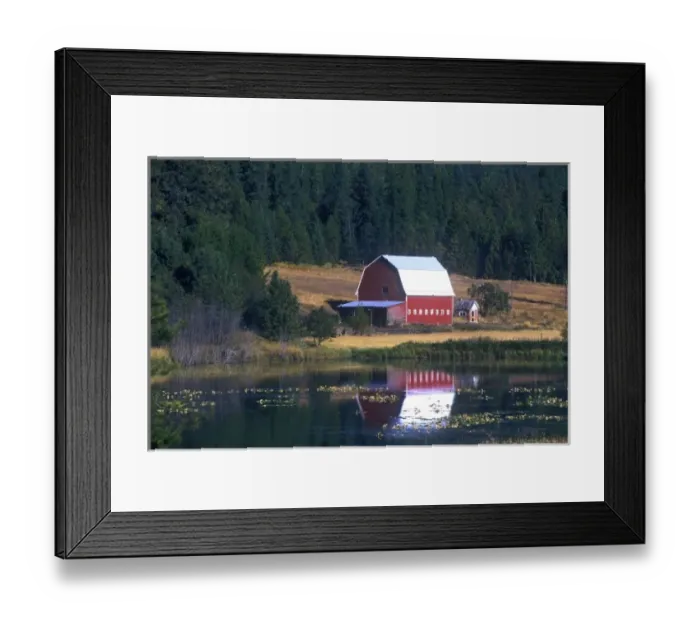 Framed Print : A red barn with sheet metal roof is reflected in a lake just north of Hayden Lake, Idaho Framed Print : A red barn with sheet metal roof is reflected in a lake just north of Hayden Lake, Idaho