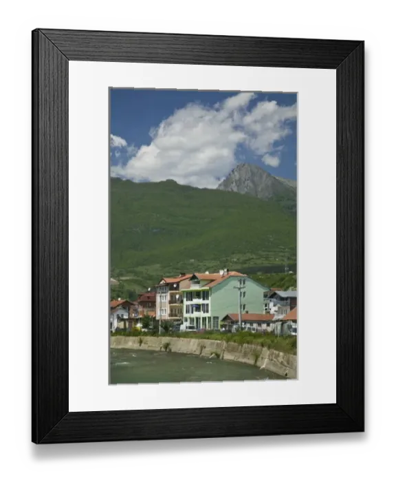 Framed Print : KOSOVO, Pec. Riverside view of the city of Pec along the Montenegrin frontier Framed Print : KOSOVO, Pec. Riverside view of the city of Pec along the Montenegrin frontier