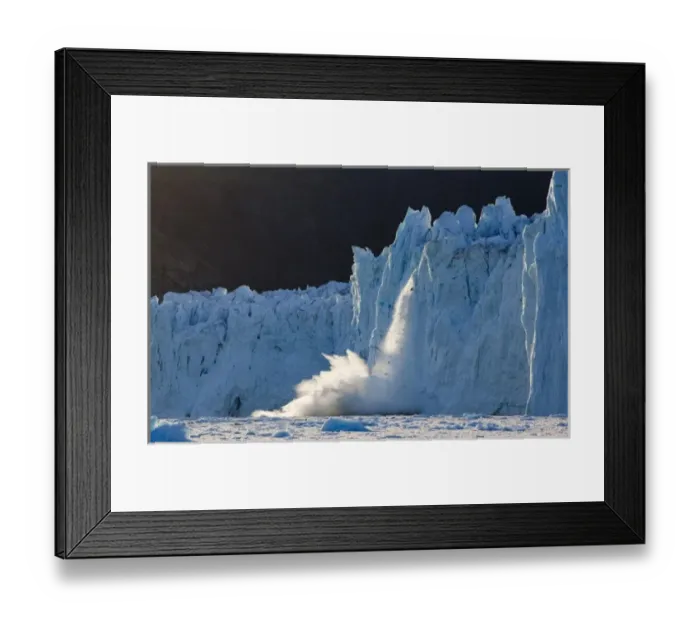 Framed Print : Greenland, Ilulissat, Setting midnight sun lights calving icebergs and resulting Framed Print : Greenland, Ilulissat, Setting midnight sun lights calving icebergs and resulting