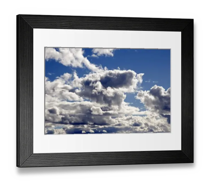 Framed Print : Cumulus clouds against a blue sky Framed Print : Cumulus clouds against a blue sky