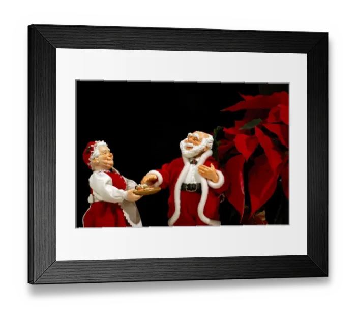 Framed Print : Holiday still life. Simpich Caracter Doll, Mr. & Mrs. Claus with cookie tray. Property released