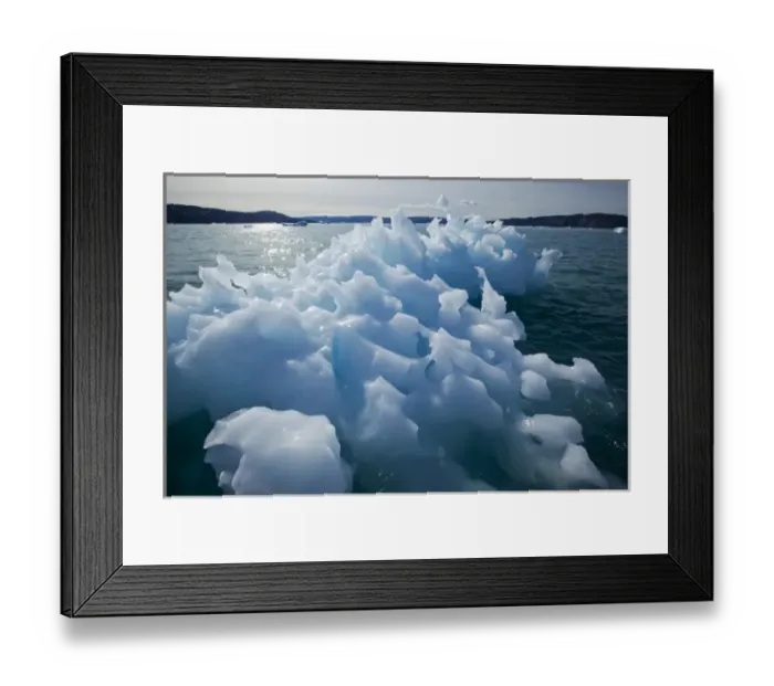 Framed Print : Greenland, Ilulissat, Midday sun lights melting iceberg near face of Eqip Glacier Framed Print : Greenland, Ilulissat, Midday sun lights melting iceberg near face of Eqip Glacier