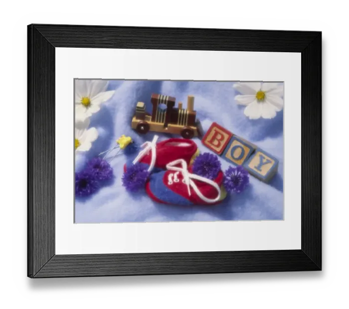 Framed Print : Arrangement of baby boy items on blue blanket Framed Print : Arrangement of baby boy items on blue blanket