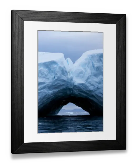 Framed Print : Greenland, Ilulissat, Arch formed within melting iceberg grounded near face of Jakobshavn