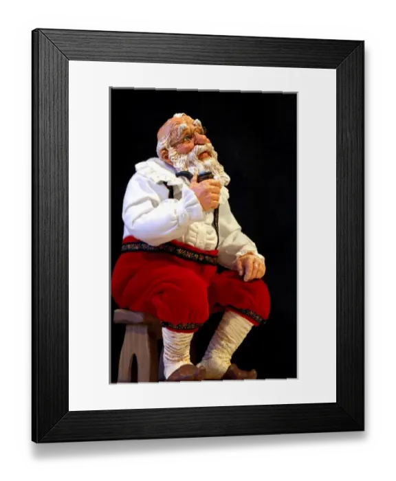 Framed Print : Holiday still life. Simpich Caracter doll, thinking Santa with pipe. Property released
