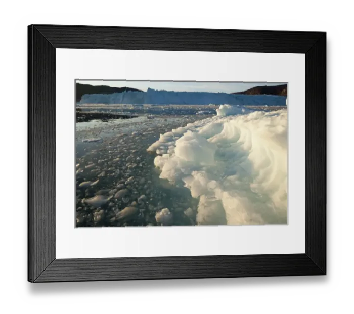 Framed Print : Greenland, Ilulissat, Setting midnight sun lights icebergs floating at face of Eqip