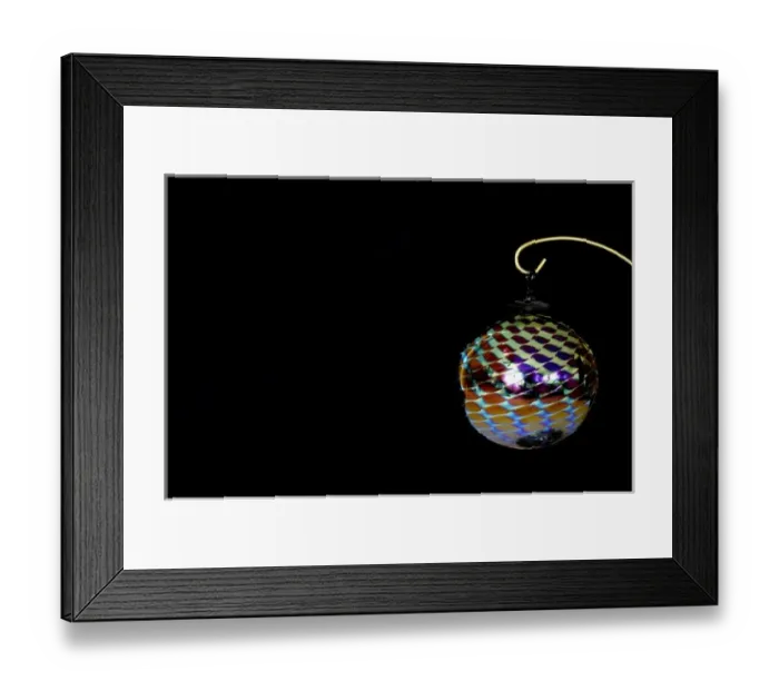 Framed Print : Holiday still life. Hand blown glass Christmas ornament. Property released Framed Print : Holiday still life. Hand blown glass Christmas ornament. Property released